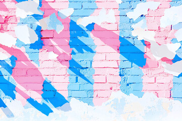 Fototapeta premium an urban backdrop featuring a brick wall with chipped blue and pink paint