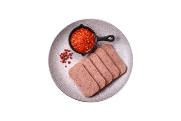 Delicious canned pink spiced ham or spam with salt, spices and herbs