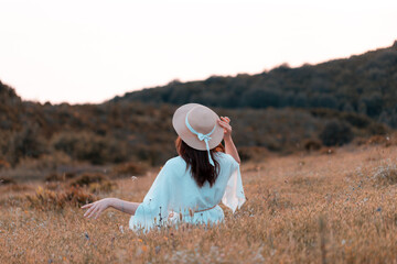 person in a hat