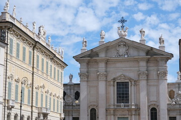 Religious architecture. Facade of the Cathedral of Mantua.The church overlooks Piazza Sordello, sculptures of Saints are superimposed on the tympanum. Italy