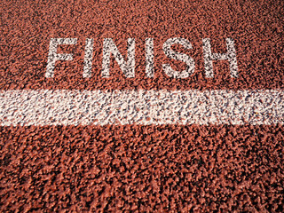 Finish line on asphalt. End of race. Inscription finish on ground. Markings for competitions of athletes on road. Finish line for cyclists. Sports background. Athletic backdrop. 3d image