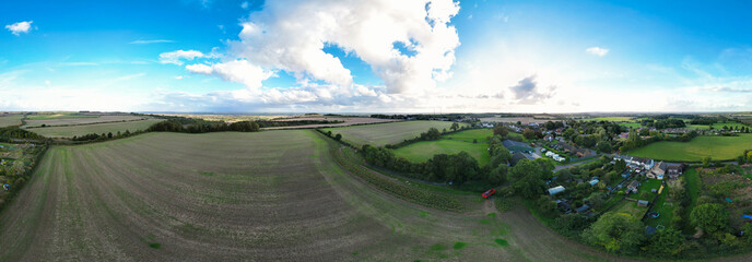 Aerial Panoramic View of British Agricultural Farms at Streatley Village and Countryside Landscape of Bedfordshire, England Great Britain of UK. Footage Captured with Drone Camera on October 7th 2024