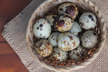 Quail eggs in a basket, Quail eggs are rich in high quality protein which is important for the growth and repair of body tissues.