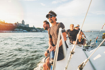 Fototapeta premium Team athletes Yacht training for the competition on sea