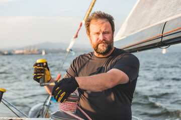 Fototapeta premium An Yacht athlete training for the competition on sea