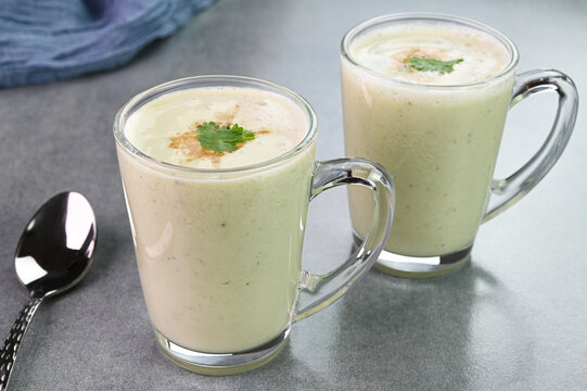 Masala chaas served in glass cups.
