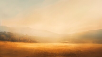 Obraz premium A misty morning landscape with golden light.