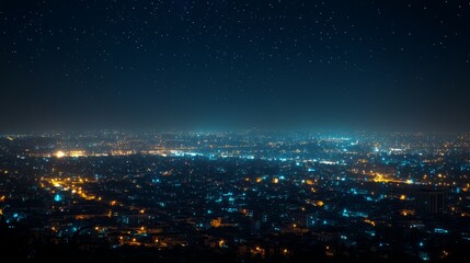 Fototapeta premium A panoramic view of a city at night with twinkling lights and a starry sky.
