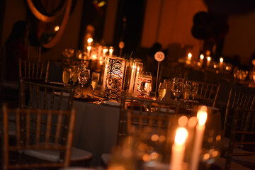 Beautiful Ballroom tables with candle lights in a ballroom