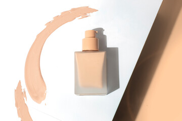 lotion cream foundation primer in cosmetic makeup bottle package and color smudge
