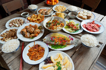 Chinese food replicas, handmade fake or models of traditional meals with various kinds of foods .
