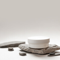 Minimalist Skincare Cream Jar on Natural Stone with Soft Neutral Background