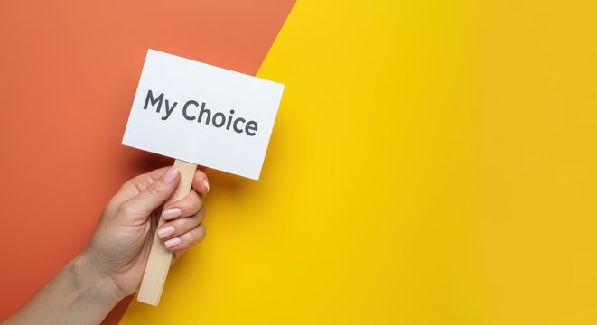 Hand holding sign with "My Choice" text on colorful background
