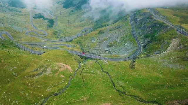 Drone aerial of Transfagarasan road with cable car at the Carpathian mountains in Romania