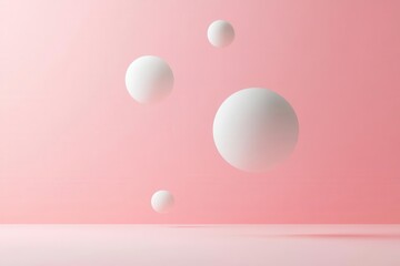 Minimalistic composition of floating spheres on a soft pink background, creating a serene and modern aesthetic.