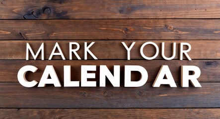 mark your calendar lettering on wooden wall planks background