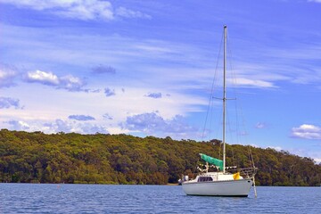 Fototapeta premium A sailboat in Batemans Marine Park in Narooma NSW Australia