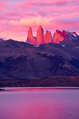 This stunning sunrise view at Lake Azul (Lago Azul) in Torres del Paine National Park, Chile,...
