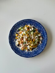 salad on a blue plate