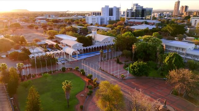 Sunset Sky Drone-View of Gaborone Botswana's Parliament in 4K with Botswana's National Flag Colours