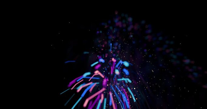 A dazzling display of sparkles and flickers like New Year's fireworks on a black background. Colorful particles in blue, purple, and yellow create a magical festive atmosphere with bokeh and motion bl