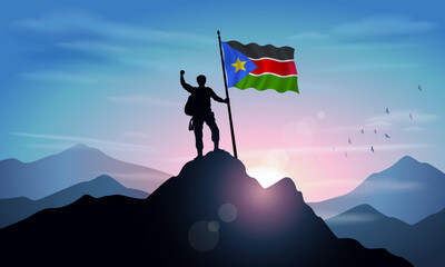 Republic of North Sudan flag, silhouette of a man holding a flag as a sign of success in reaching the top of the mountain with the morning sun in the background. Vector Illustrator