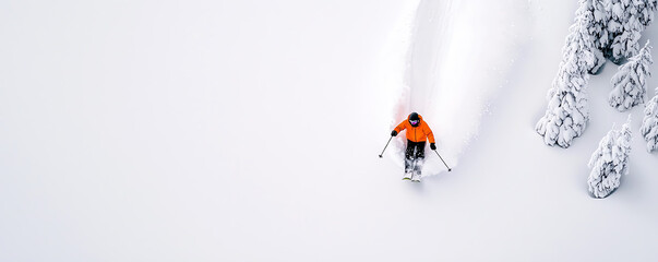 Extreme snowboarding on a backcountry slope, rider performing a freestyle spin over untouched snow, dramatic action shot