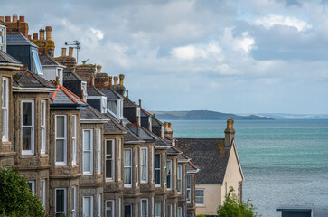 Hilltop view of typical english row houses at the coast of Penzance, Cornwall