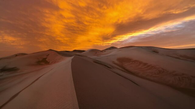 Timelapse of sunset over the sand dunes in the desert. Sahara desert