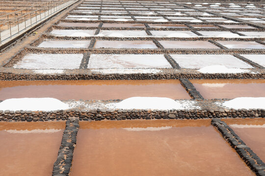 Evaporating ponds in salt production process
