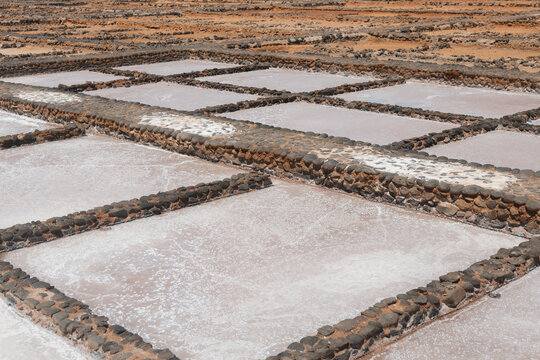 Overhead view of traditional salt pans in production