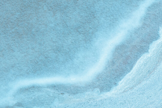Closeup view of salt deposits on a textured surface