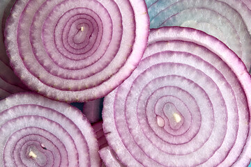 Fototapeta premium Onions contain compounds that reduce cholesterol levels and support healthy blood pressure, both of which are beneficial for a healthy heart. 