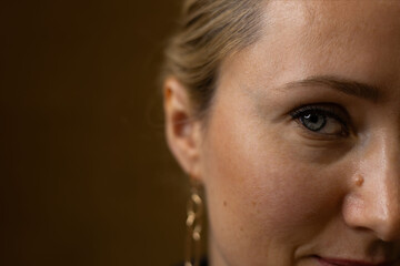 makeup artist doing eyelash lamination for a client