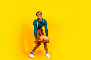Photo of guy hold carry big turkey for thanksgiving day heavy isolated bright color background