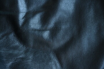 Fototapeta premium black leather jacket close up, macro black leather jacket texture, soft yet rugged, capturing the grain and stitch details with a worn-in feel 