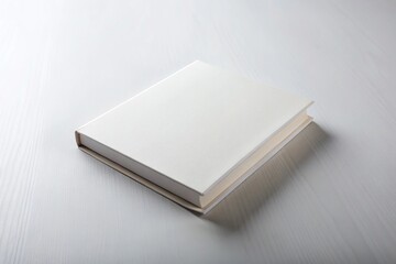 Fototapeta premium Minimalist white book on surface