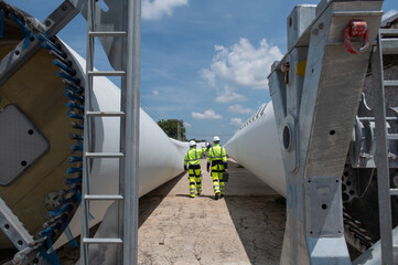 Wind Turbine Maintenance and Repair Technician, Engineer Checking Turbines working maintenance clean power generator system