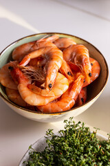 Raw shrimp in a ceramic bowl