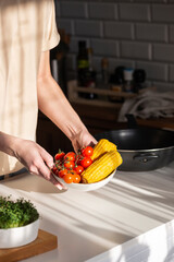 tomatoes and corn, vegetarian dishes, preparing healthy food