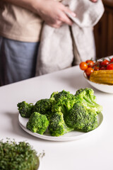 Broccoli on a plate for preparing a healthy lunch