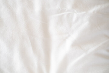 Abstract White Bedding Sheets or White wrinkled fabric background texture and Texture with copy-space :Creased or wrinkled white fabric,Soft focus