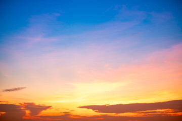 Beautiful , luxury soft gradient orange gold clouds and sunlight on the blue sky perfect for the background, take in everning,Twilight, Large size, high definition landscape photo