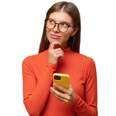 Pensive woman thinking, trying to make up good message, holding phone