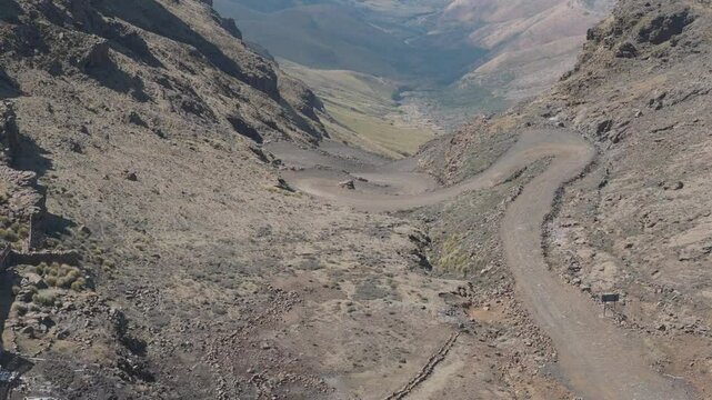 Aerial view from top of Sani Pass, infamous gravel road mountain pass between South Africa and Lesotho