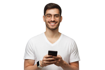 Handsome man looking straight at camera while holding his phone