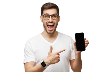 Young excited man in white t-shirt and glasses, pointing finger to blank screen of phone to viewer with WOW face