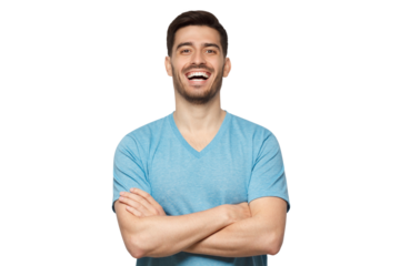 Portrait of young positive guy wearing light blue t-shirt, standing with arms crossed, laughing happily at joke