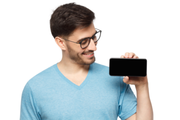 Young handsome man smiling holding and showing blank phone with copy space for ads of app