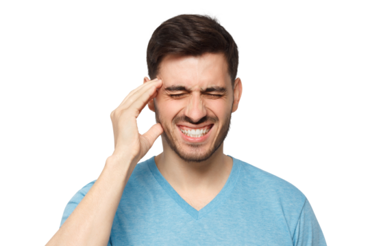 Headache concept. Young man showing how much his head hurts, experiencing pain